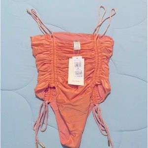 Peach one piece swim suit
